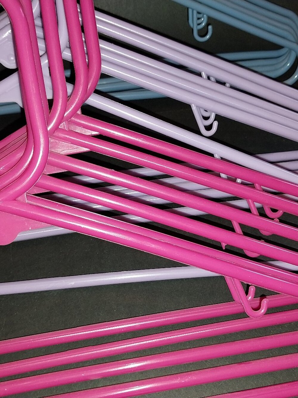 Multi-Colored Plastic Hangers Lot of 17